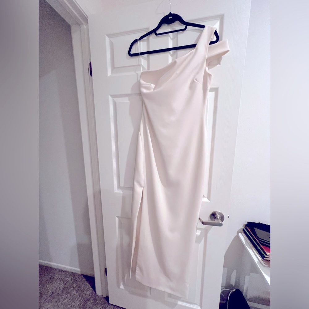 Likely one shoulder dress- worn once!